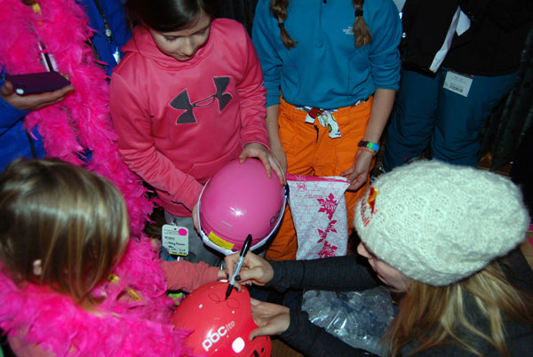 Lindsey Vonn signs Anya's helmet. Unlike some of the girls, my daughter took a pass on the forehead signing.