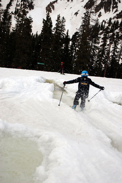 Quinn pond skims across one of the many water-filled troughs at A-Basin. 